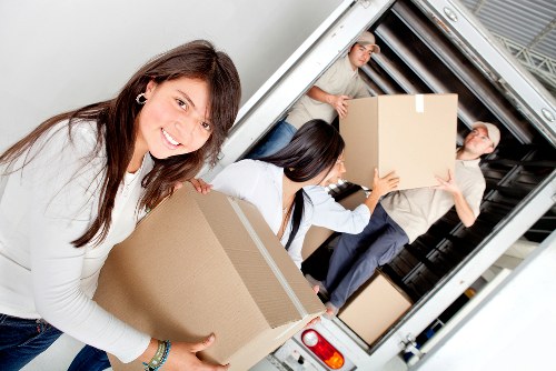 Professional movers handling furniture during a small relocation in Parkroyal